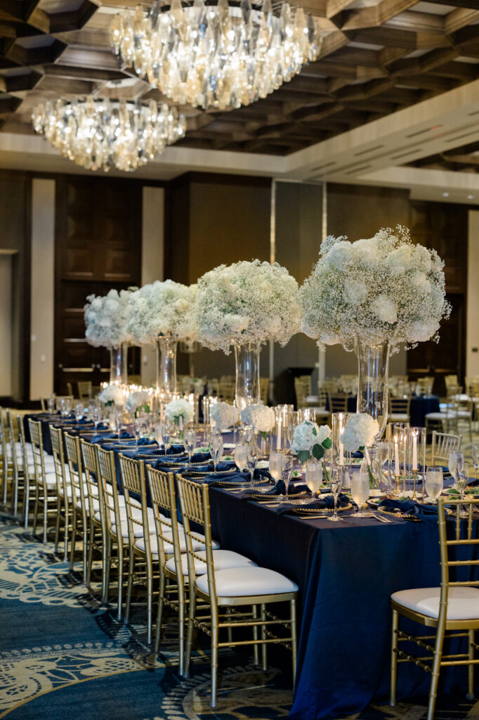 The grand reception bridal party table by San Antonio wedding vendor Lois M Photography.