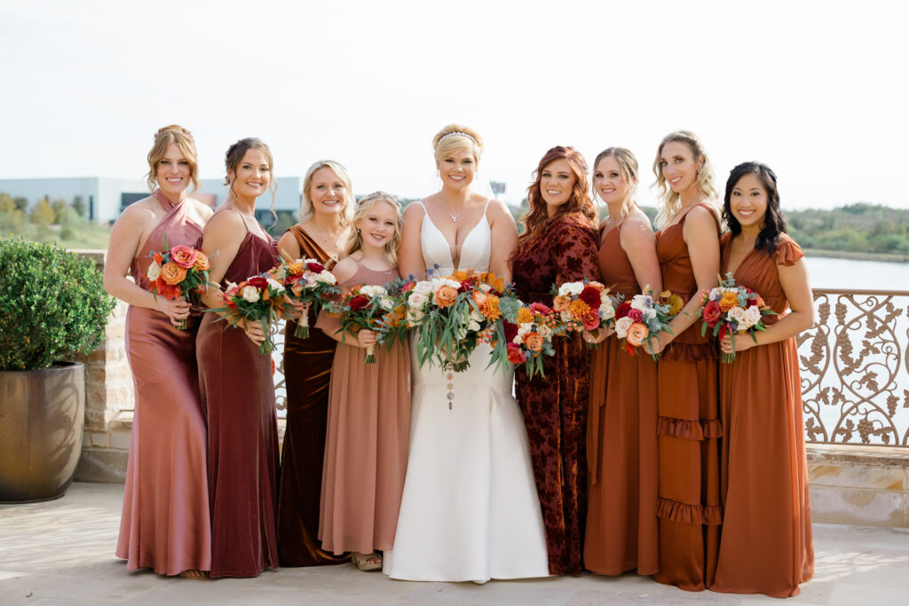 Bride and Bridesmaids with flower arrangements by Evember Floral Design in San Antonio. 