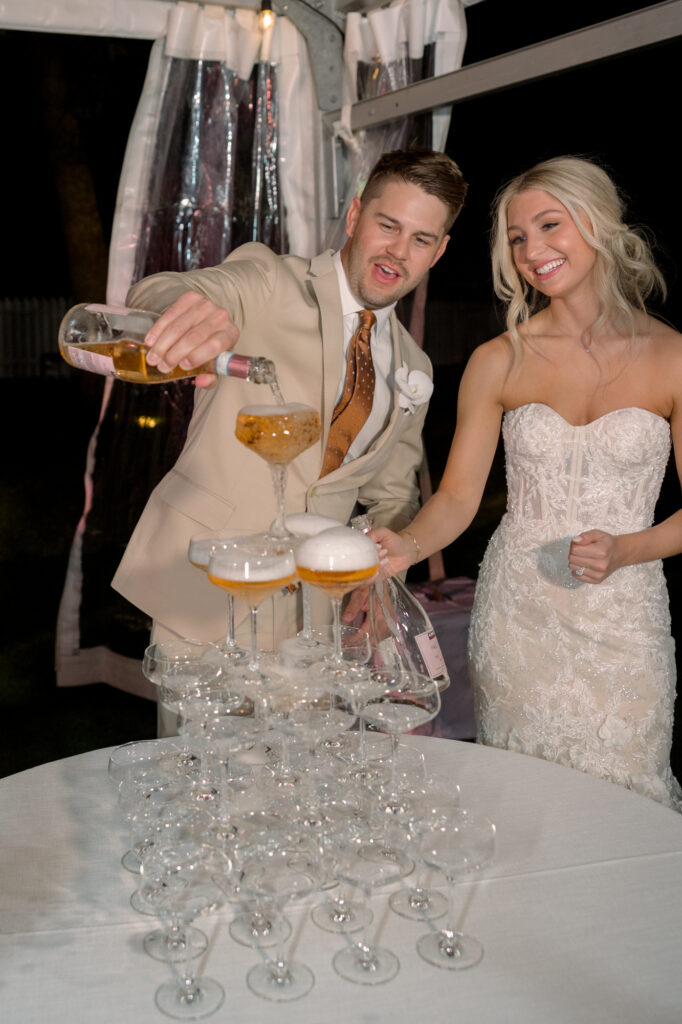 champagne tower one of 2024 wedding trends 