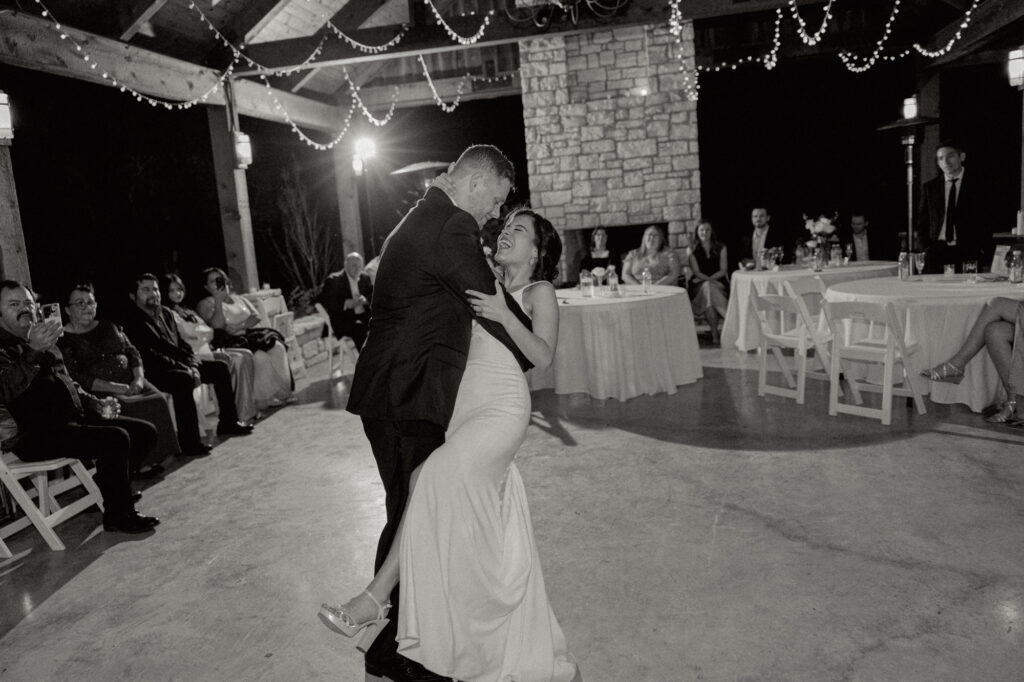 The bride and groom doing their first dance during their reception at Jacob's Well Vineyard.