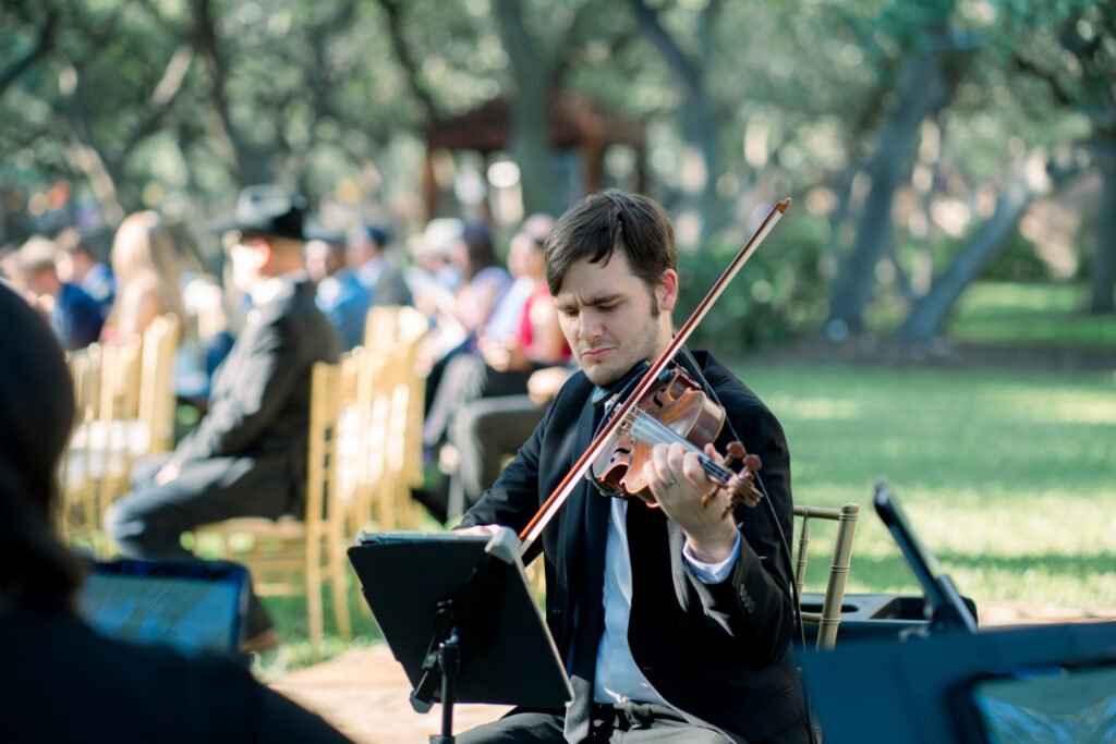 San Antonio Wedding Musicians Cello Vida playing at the Veranda for a Wedding Ceremony by Lois M Photography