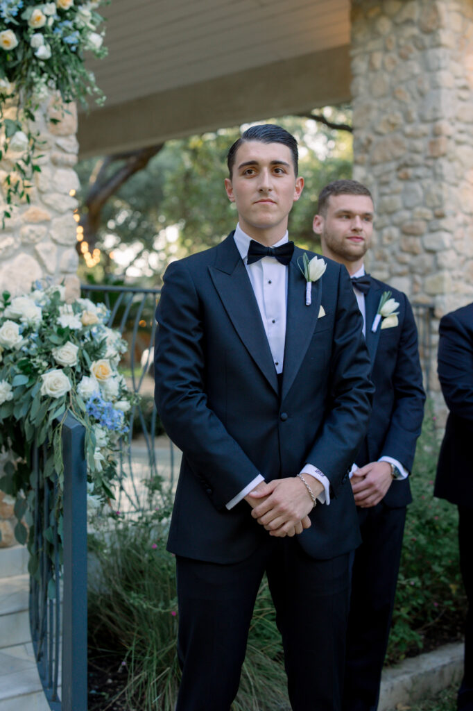 groom seeing his bride during the ceremony as she walks down the aisle at the Veranda in San Antonio, Texas 