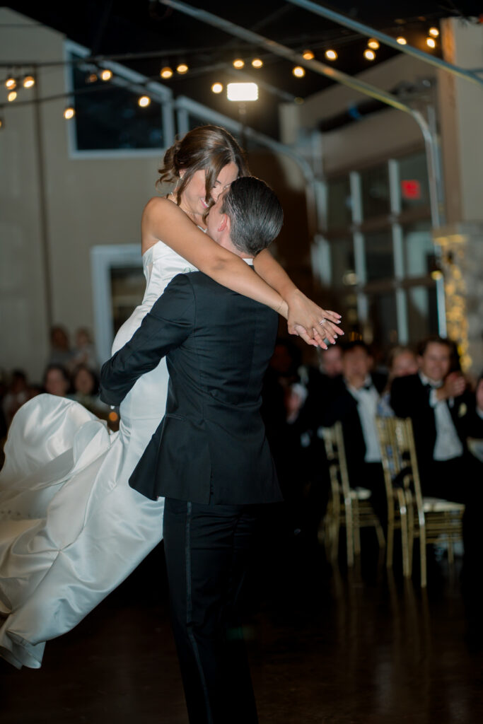 Bride and groom during their first dance in the reception space at the Veranda San Antonio