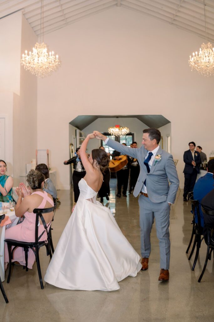 Bride and groom dancing in Posey Meadows reception hall