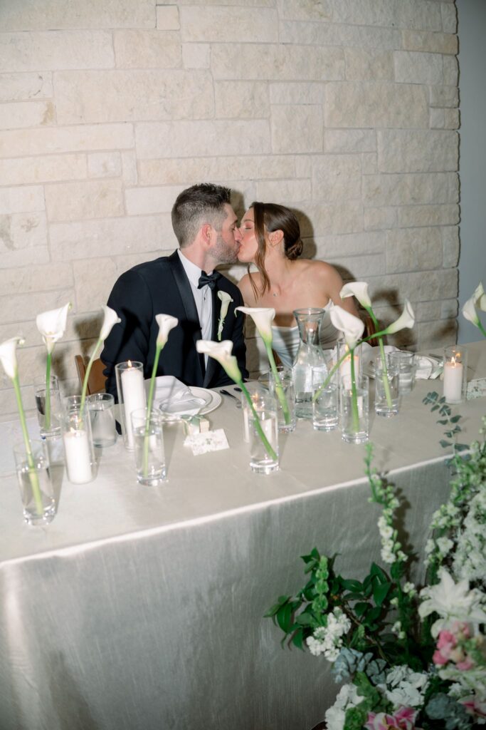 Bride and groom kissing at Ranch Austin