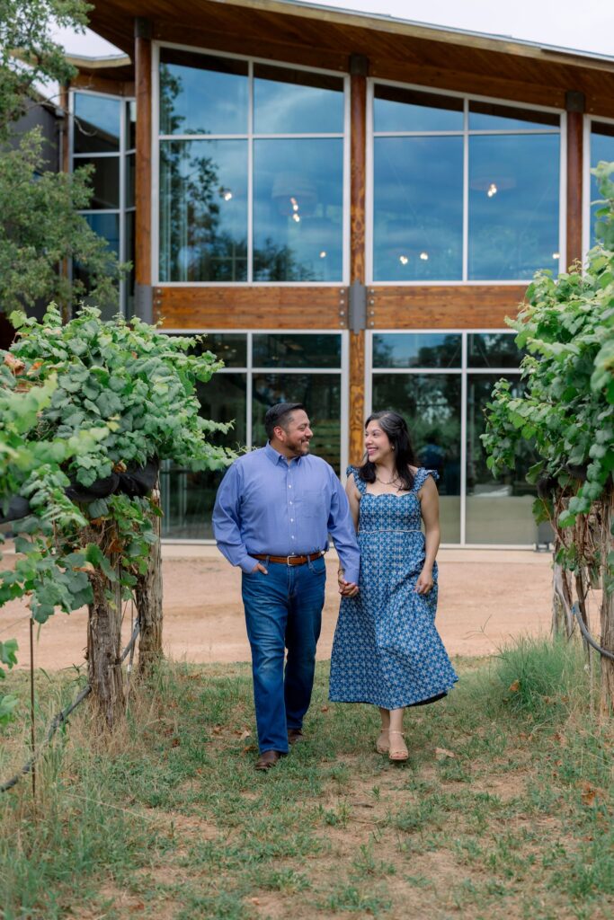 A man and woman walking at William Chris Vineyards